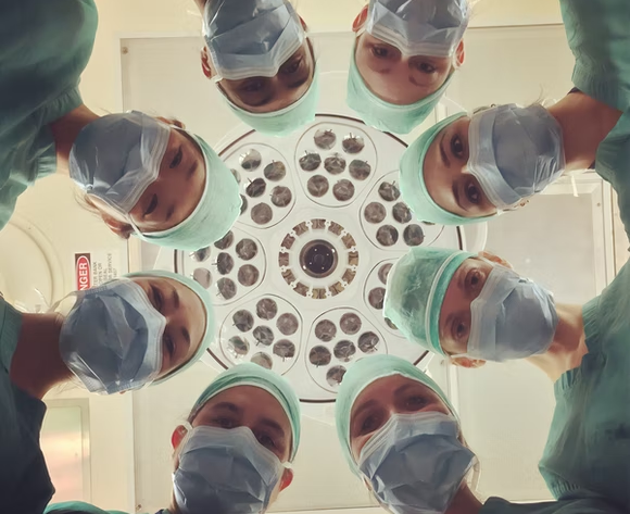 Clinical rotations guide- surgeon in circle around camera